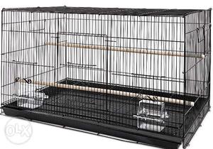 Thick black metal bird cage newly bought for sale with