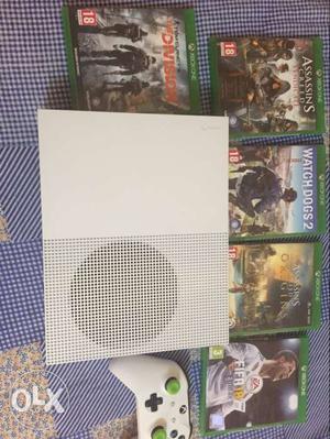 Xbox one s 4 months old with new game cds