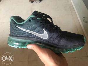 Black And Green Nike Athletic Shoe