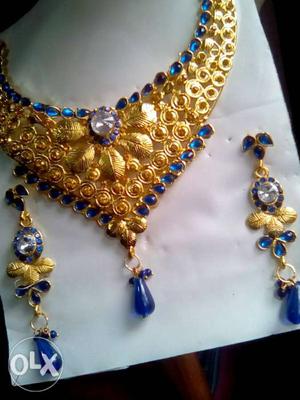 New golden coloured sets with deep blue stones...