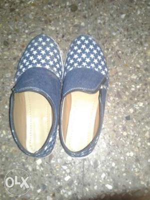 Pair Of Blue-and-white Slip On Shoes
