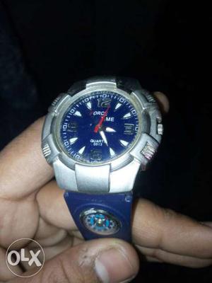 Quartz brand watch.
