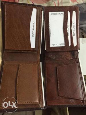 Two Brown Leather Wallets