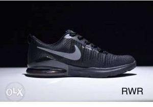 paired Black And Gray Nike RWR Running Shoe