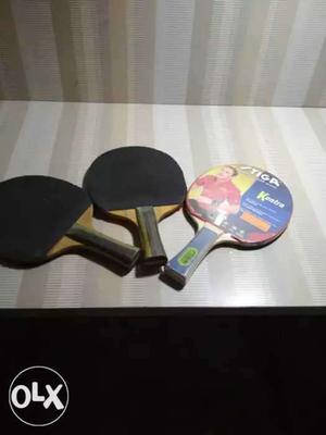 3 table tennis rackets (one racket is unused packed)