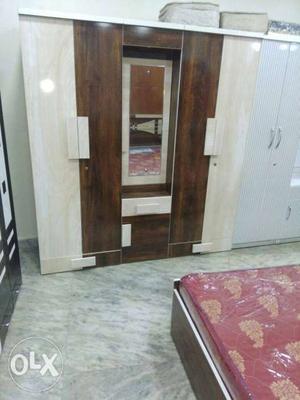Brown And Beige Wooden Cabinet With Mirror
