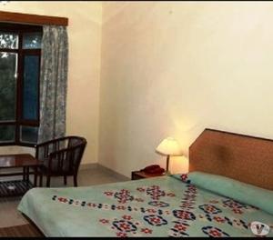 Get Hotel Baghal, Darlaghat - HPTDC in,Solan New Delhi