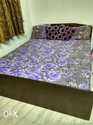 Queen size bed with storage box and draw