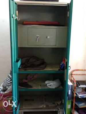 Steel cupboard for sale. it has locker in it.