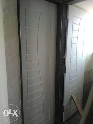 Two Gray Wooden Doors