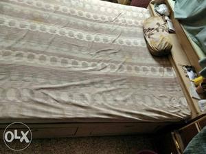 Wooden double bed with mattress with storage in