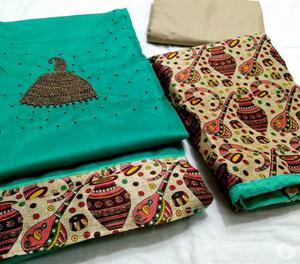 elegant cotton and silk dress materials available Erode