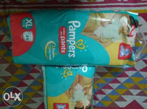 1full pack and 1half of pampers XL size... total