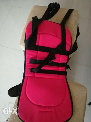 Baby's Pink And Black Carrier