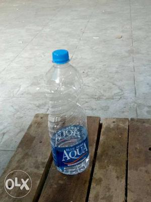 Blue And White Plastic Bottle