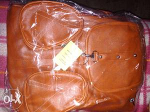 Brown Leather Backpack With Clear Plastic Pack