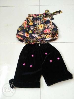 Floral top and black short for one year baby girl