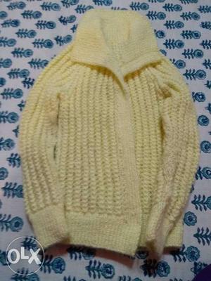 Hand knitted jacket style sweater for a 3-4 yrs age group