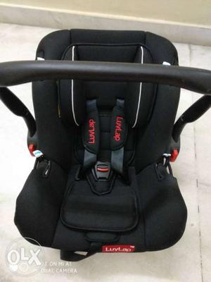 Infant luvlap car seat, never used, selling for