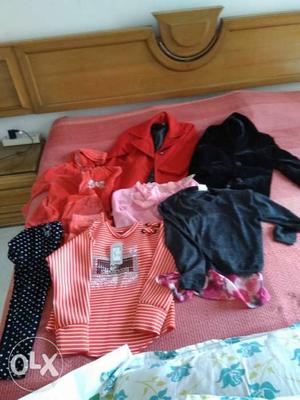 Kids used clothes and two new tops for kids with