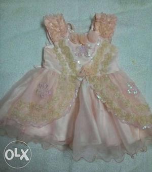 Peach colour baby frock size 16