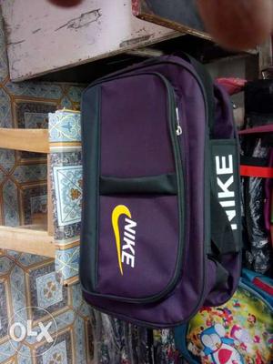 Purple, Yellow, And Black Nike Duffel Bag