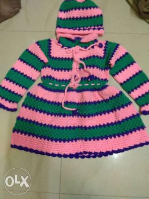 White, Pink, And Green Knitted Textile