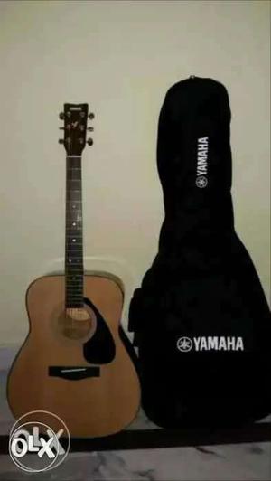 7month old yamaha 6 string acoustic guitar with original