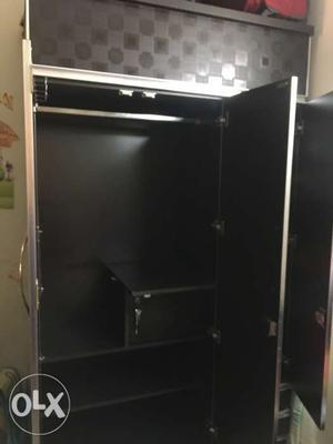 Black Wooden Cabinet With Shelf