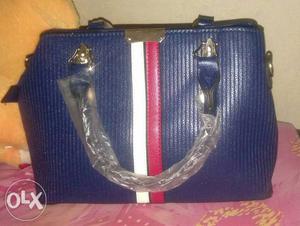 Blue, White, And Red Leather Hand Bag and not used