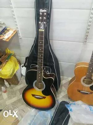 Brown And Black Single Cutaway Acoustic Guitar With Black