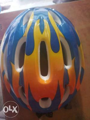 Gray And Blue Bicycle Helmet