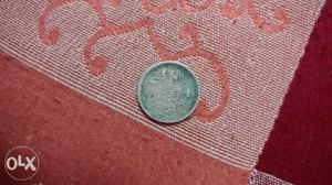 Round Silver-colored Coin 1/4 indian rs 25 paise