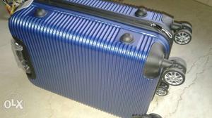 Blue And Black Hard Case Luggage Bag
