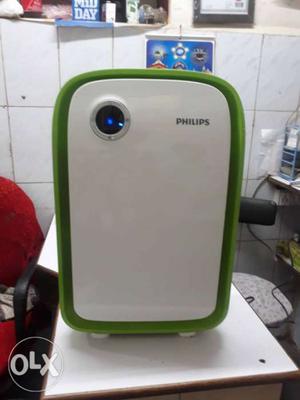 White And Green Philips Electronic Device