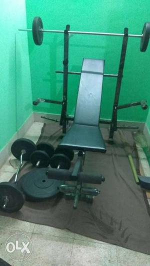 50kg bench press with straight and curl rod, 2 dumbells