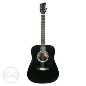 Black colour jumbo size Guitar in a very good