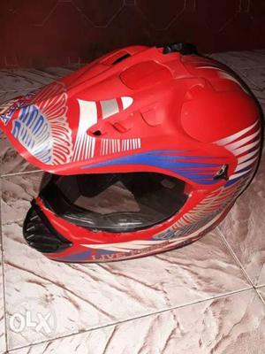 Red And Blue Motocross Helmet