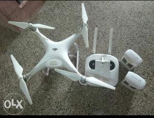 White DJI Quadcopter Drone With Controller