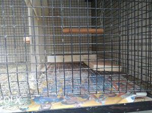 A cage with tray heavy-metal.size 4x3.