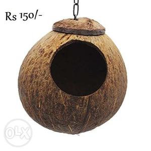 Coconut shell nest for birds