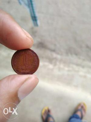  Bronze-colored 1 Indian Coin