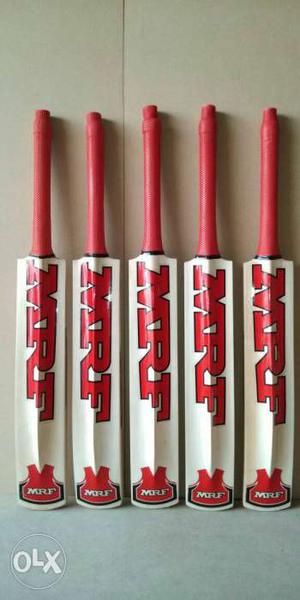 Five White-and-red MRF Cricket Bats