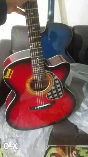 Red accoustic Guitar