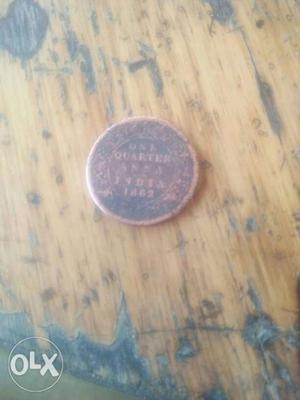 Round  Copper-colored 1 Quarter Anna Coin