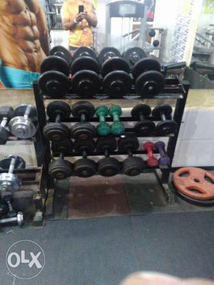 Rubber dumbell with stannd