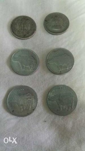 Six Round Silver-colored 25 Indian Paise Coins
