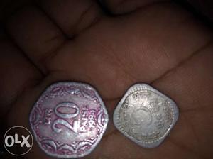 Two Silver-colored 20 And 5 Indian Paise Coins