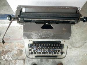 Vintage White And Black Typewriter