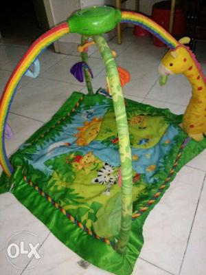 Baby's Green, Yellow, And Blue Activity Mat